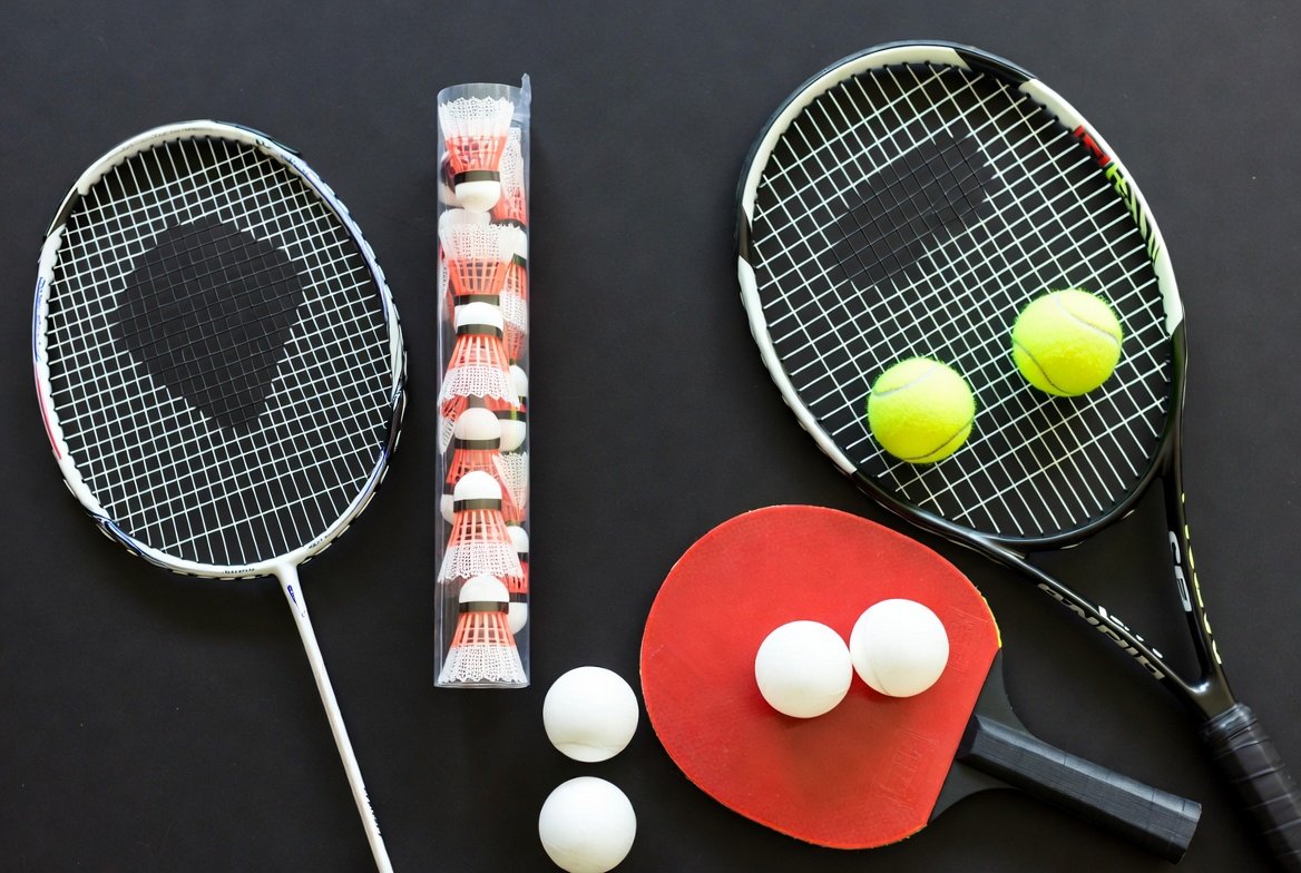 Racket sports equipment including badminton and tennis rackets